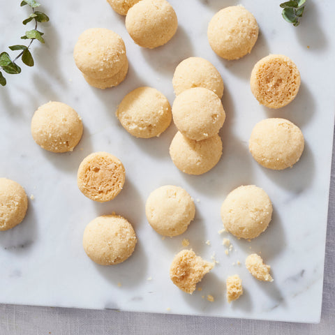 Sugee cookies displayed on a chic white marble board, from the Abundance Gift Box