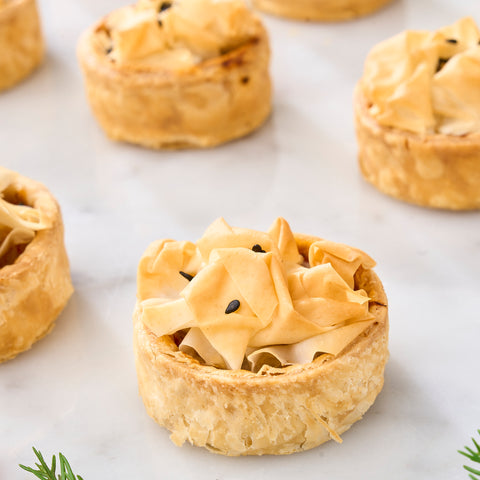 A merry group of mini Curried Lamb and Potato Pies