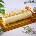 Yuzu Pistachio Log Cake