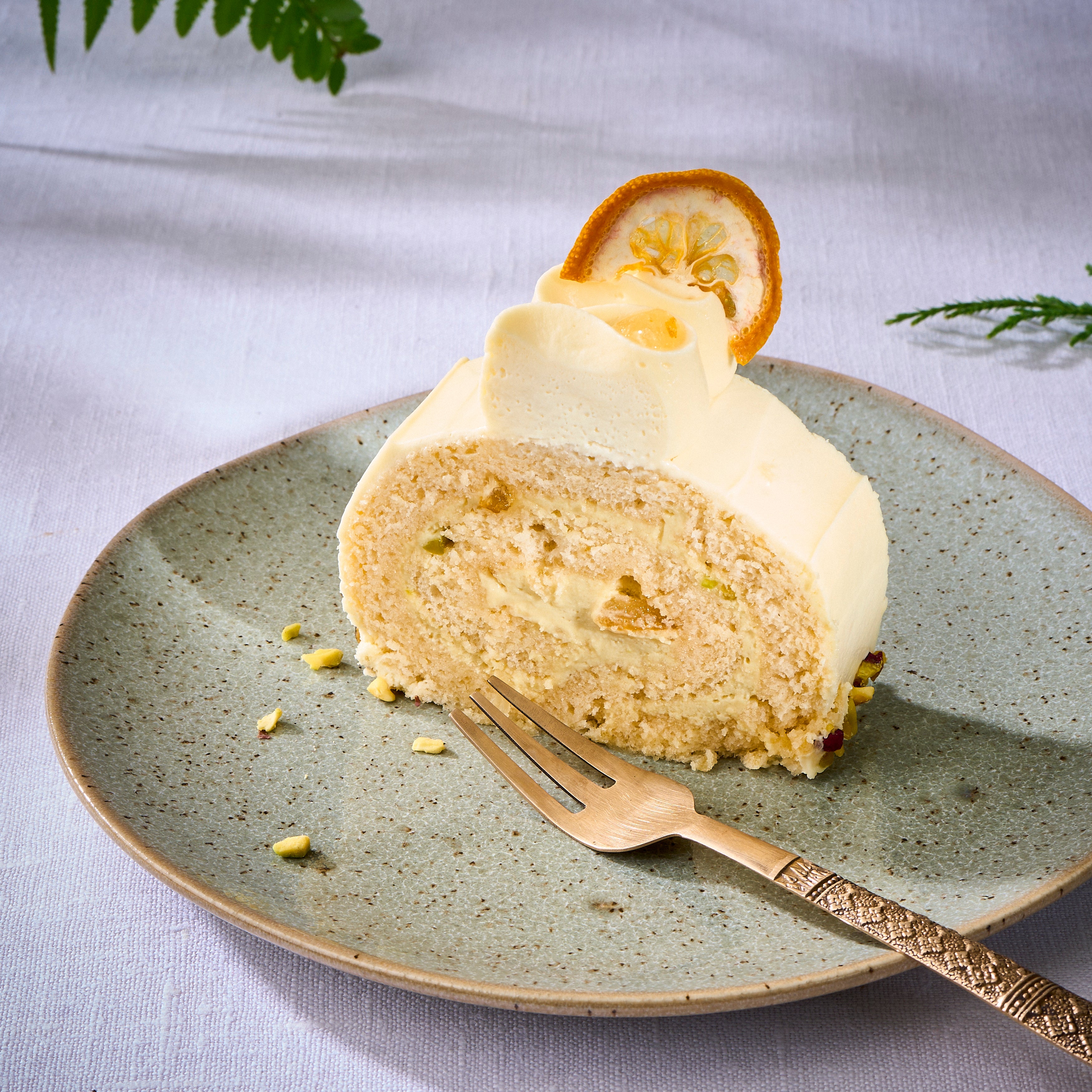 Yuzu Pistachio Log Cake
