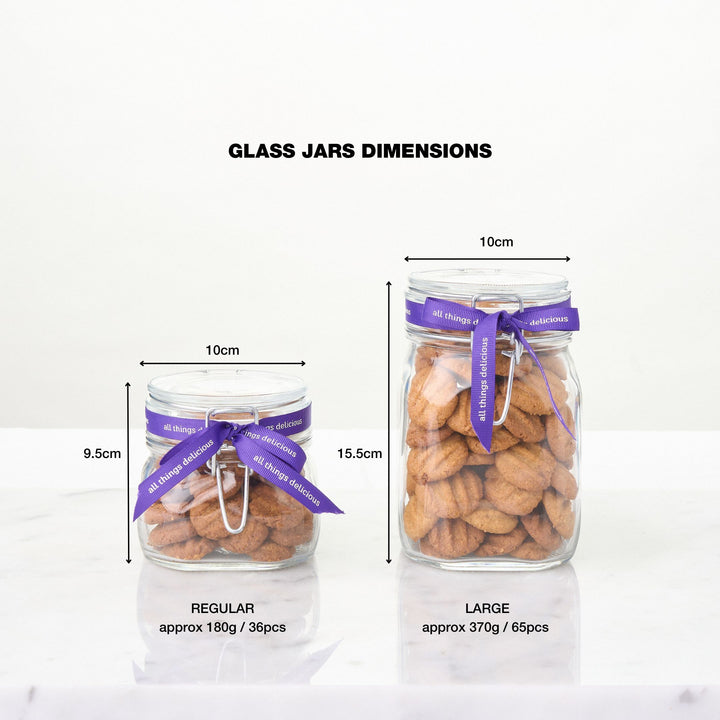 Side by side comparison of our glass cookie jars filled with Coconut Gula Melaka cookies